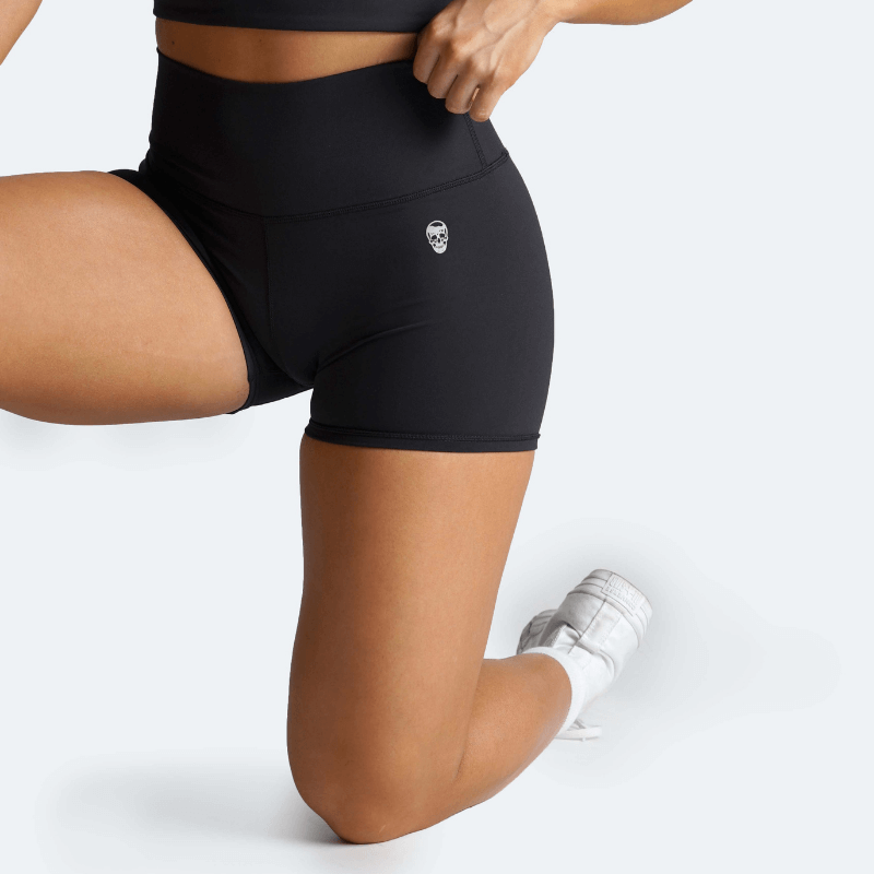 womens training shorts black kneeling