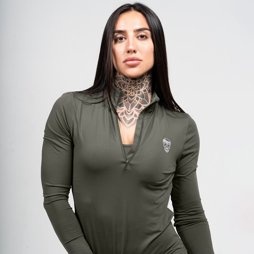 womens performance 1/4 zip green detail